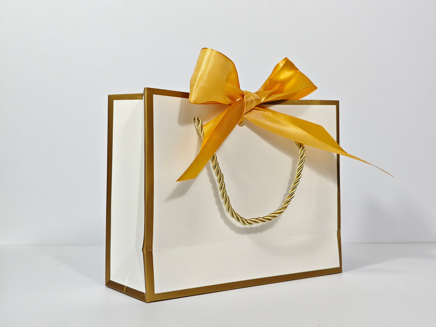 C1 White Paper Gift Bag with Gold Border and gold ribbon C1 19*15*7cm
